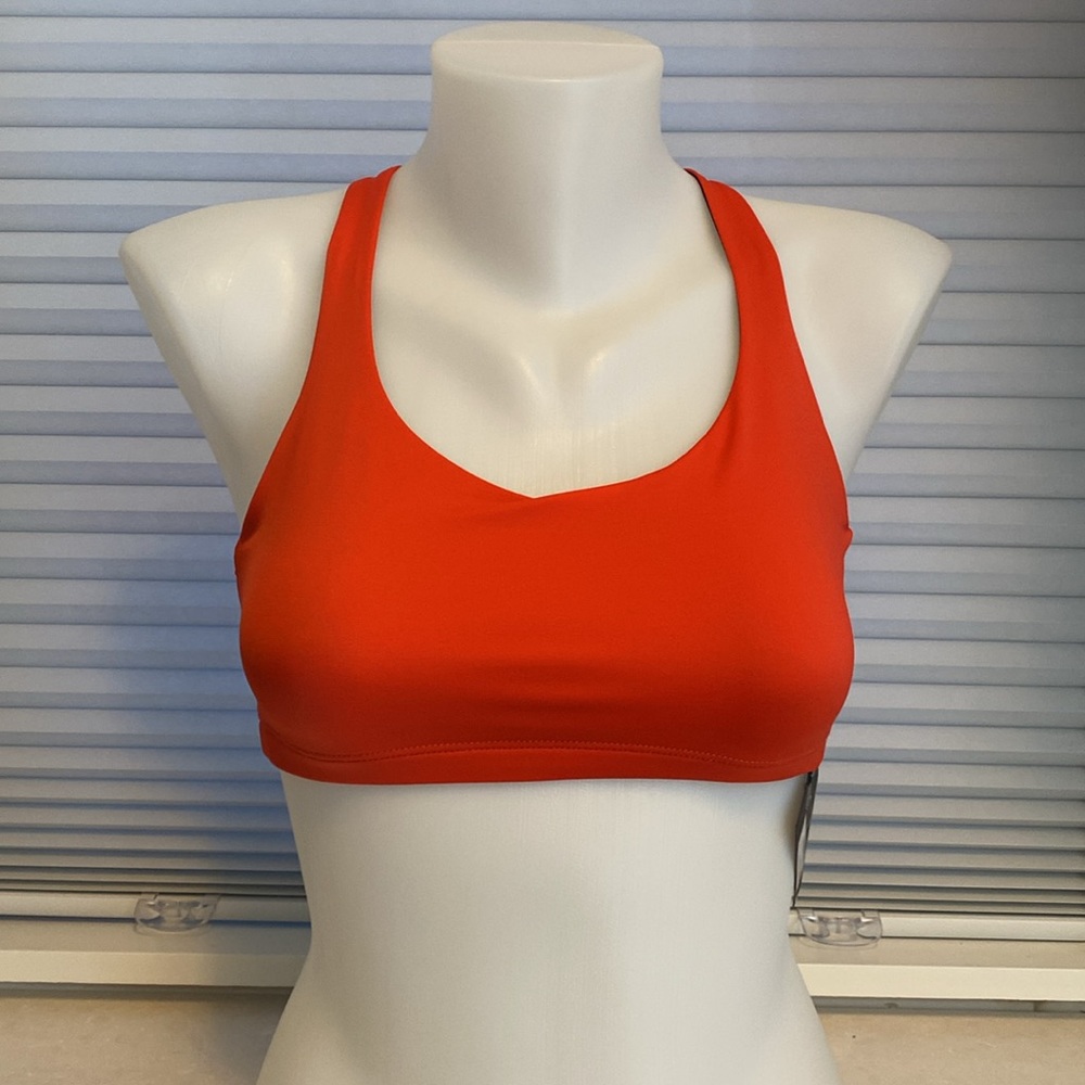 Onzie Yoga Bra top. Swim top. BNWT. Poppy red colour. 
S/M Onzie size
